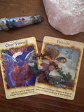 Two tarot cards and a pendulum arranged for a quick mapped insight reading